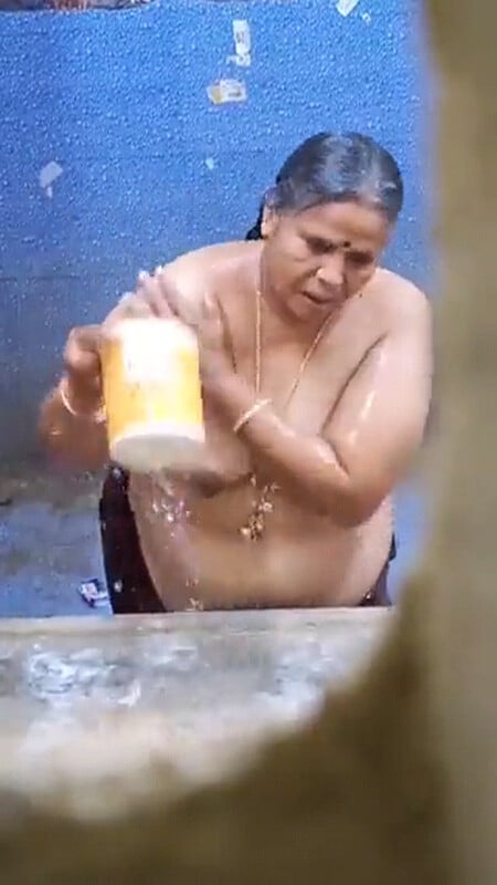 Neighbor aunty nude bathing